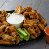 Classic Wings Tray · A combination of wings and drummettes served with celery sticks and your choice of housemade...