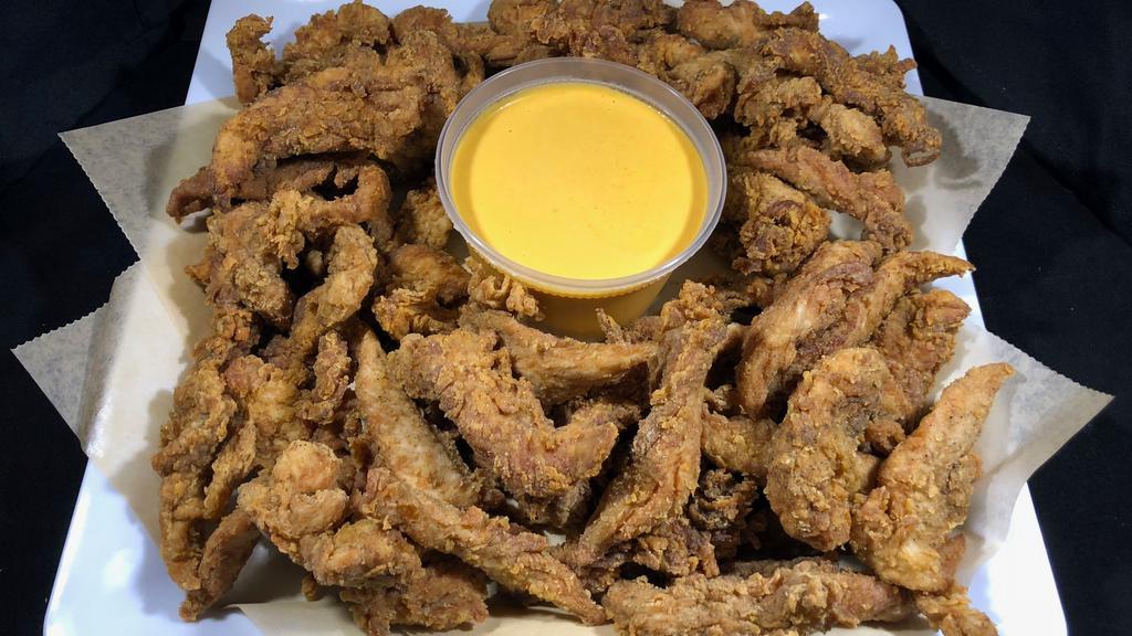 Chicken Tender Tray · 40 or  60 specially seasoned, all-natural chicken tenders marinated for 24 hours in buttermilk, hand-breaded and fried to perfection.