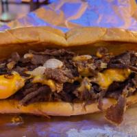 Philly Cheesesteak · Greasy, cheesy, and steak-y. Our Philly Cheesesteak is made with sliced Steak topped with Gr...