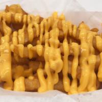 Cheese Fries · Extra crispy battered fries topped with melted nacho cheese.
Small $2.75 / Large $4.99