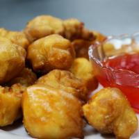 Sweet And Sour Chicken · Fried chicken breast coated with sweet and sour sauce