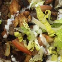 Lamb Over Rice · served with lettuce ,tomato, onion , with our home made white sauce