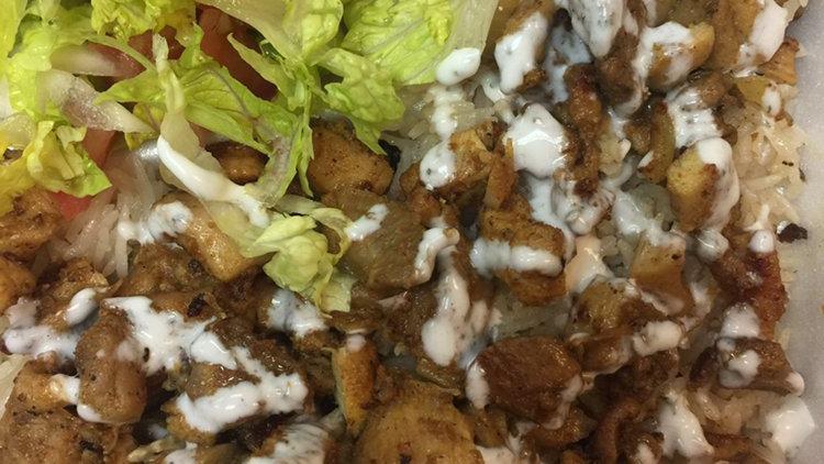 Chicken Over Rice (Gyros) · SERVED WITH LETTUCE ,TOMATO,ONIONS,WITH OUR HOMEMADE WHITE SAUCE