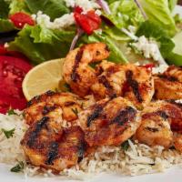 Grilled Shrimp Feast · Seasoned and grilled with lemon juice,
butter, and just a touch of blackened
seasoning. (670...