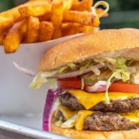Classic American Burger · Two quarter pound flat top grilled patties. Includes American cheese, lettuce, tomato, onion...