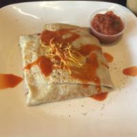 Western Omelet Crepe · 2 Scrambled Eggs, Ham, Cheddar, Onions & Peppers served with a Side of Salsa