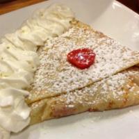 Strawberry Crepe · Fresh Strawberries and Sugar Crepe topped with Powdered Sugar