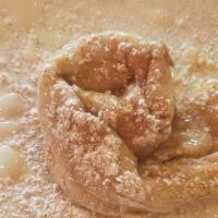 Cinnamon Bun Crepe · Sweet Cream Cheese filled Crepe topped with Powdered Sugar, Cinnamon and Glaze