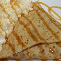 Bananas Foster Crepe · A Crepe seasoned with melted Butter and Brown Sugar, filled with Bananas then topped with Gr...