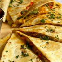 Fajita Quesadilla · A flour tortilla with beans and cheese with your choice of grilled chicken, beef, or mixed w...
