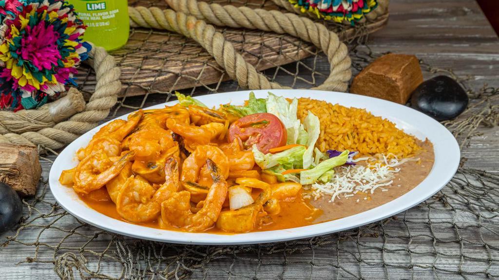 Camarones A La Diabla · Shrimp or octopus cooked with garlic served with special salsa (hot), rice, avocado and mayonnaise. Not served with beans.