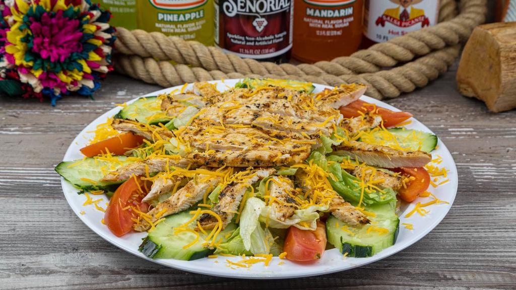 Chicken Salad · Crispy green lettuce topped with grilled chicken breast, tomato, cucumber, cheese your choice of dressing.