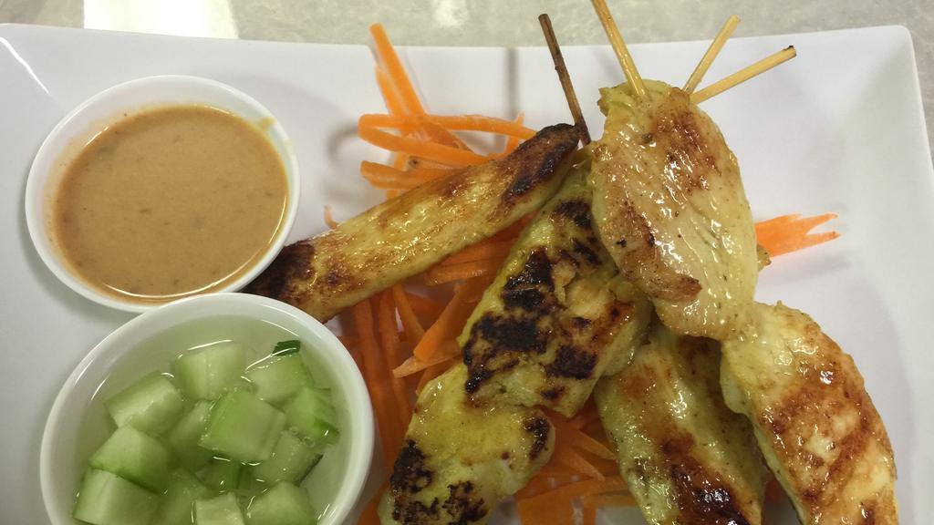 Satay Chicken (4 Pc) · Chicken on skewered marinated with thai herbs, served with peanut sauce and cucumber sauce.