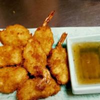 Coconut Shrimp · Crispy coconut shrimp served with sweet plum sauce.