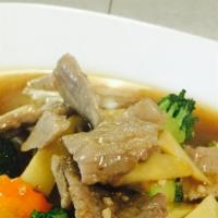 Radnar · Stir-fried flat rice noodle with egg, broccoli, bamboo shoot, mushroom, carrot in thick brow...