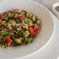 Quinoa Salad · Our amazing middle eastern Quinoa Salad made with quinoa, chickpeas, cucumber, bell pepper, ...