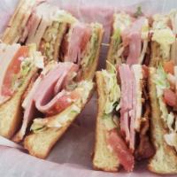 The Arbor Club · Triple decker sandwich on white texas toast with turkey, ham, bacon, Swiss cheese, Provolone...