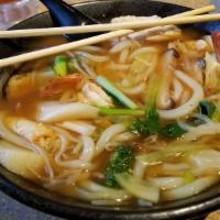 Spicy Seafood Udon · Seafood Stew served with Thick Japanese Noodles.
