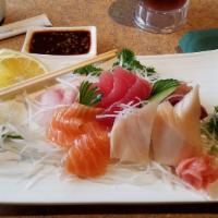 Sashimi Regular · Assortment of Sliced Raw Fish.