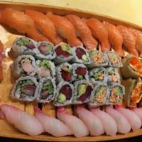 Large Boat · Chef's Choice of 22 pieces of Nigiri and 18 pieces of Maki Sushi.