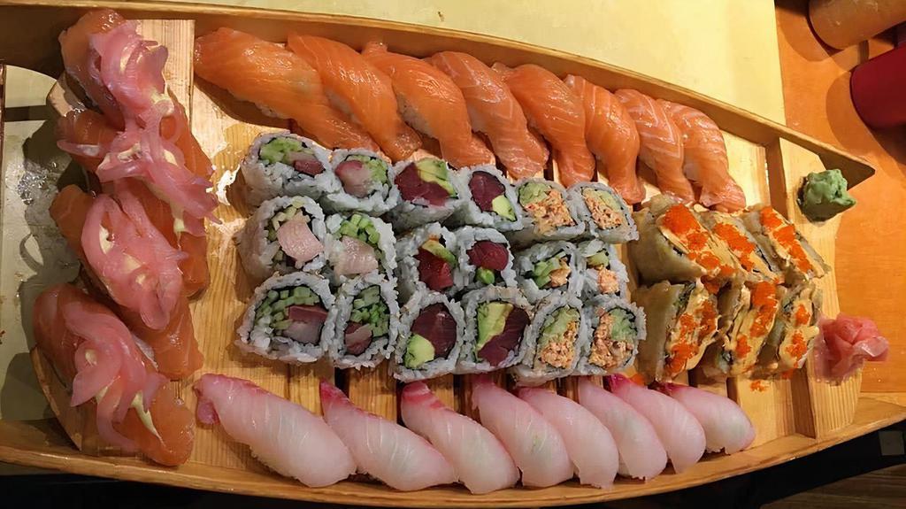 Large Boat · Chef's Choice of 22 pieces of Nigiri and 18 pieces of Maki Sushi.