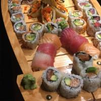 Super Boat · Chef's Choice of 44 pieces of Nigiri and 18 pieces of Maki Sushi.