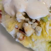 Wedge Salad · blue cheese crumbles, bacon and tomato