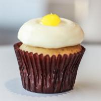 Lemon Drop Cupcake · Vanilla cake with a lemon filling, lemon butter cream icing, and a dollop of lemon.