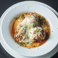 Baked Meatball Appetizer · Three homemade meatballs baked with marinara sauce, mozzarella and parmesan cheese