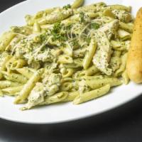 Chicken Penne Pesto · Homemade pesto served over al dente penne with a generous portion of sauteed chicken