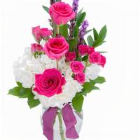  Tender Love · A bright and bold combination of gorgeous hot pink roses and spray roses, white hydrangea, l...
