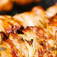 Chicken Shish Taouk · Grilled Marinated Chicken Breast Skewer, Lettuce, Pickles & Creamy Garlic spread