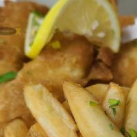 Famous Fish & Chips · Newcastle Beer battered cod with Idaho fries.