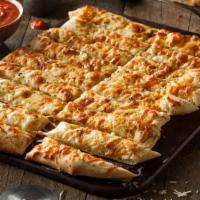 Cheesy Bread  · Fresh baked bread brushed with garlic butter and olive oil topped with mozzarella and chedda...