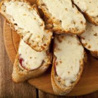 Garlic Cheese Bread  · 8 pcs Classic Italian bread prepared with melted mozzarella cheese, garlic butter, oregano, ...