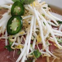 Original Pho W/ Beef · Twelve-hour combination bone broth with rice noodles, bean sprouts, onions, fresh scallions,...