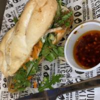 Original Banh Mi W/ Chicken · French baguette, green leaf lettuce, house-made paté, mayo, pickled daikon and carrots, cucu...