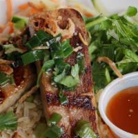 Rice Bowl W/ Pork Belly · Jasmine brown rice with green leaf lettuce, pickled daikon, and carrots, cucumber, fresh min...