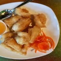 Fried Calamari · Fresh squid tossed in a light batter and deep fried until golden brown, served with sweet an...