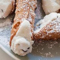 Cannoli · Italian pastry shell filled with sweetened ricotta cheese and chocolate bits.