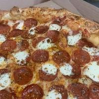 Pepperoni · A classic NYC style pepperoni & cheese pizza.