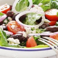 Greek Salad · Romaine lettuce, tomatoes, cucumbers, Kalamata olives, onions, and feta cheese with dressing.