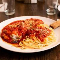 Chicken Parmigiana · Breaded Chicken meat with Mozzarella Cheese over the Spaghetti with Homemade Marinara sauce