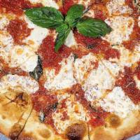 Margherita Pizza · Fresh mozzarella, tomato, and fresh basil.