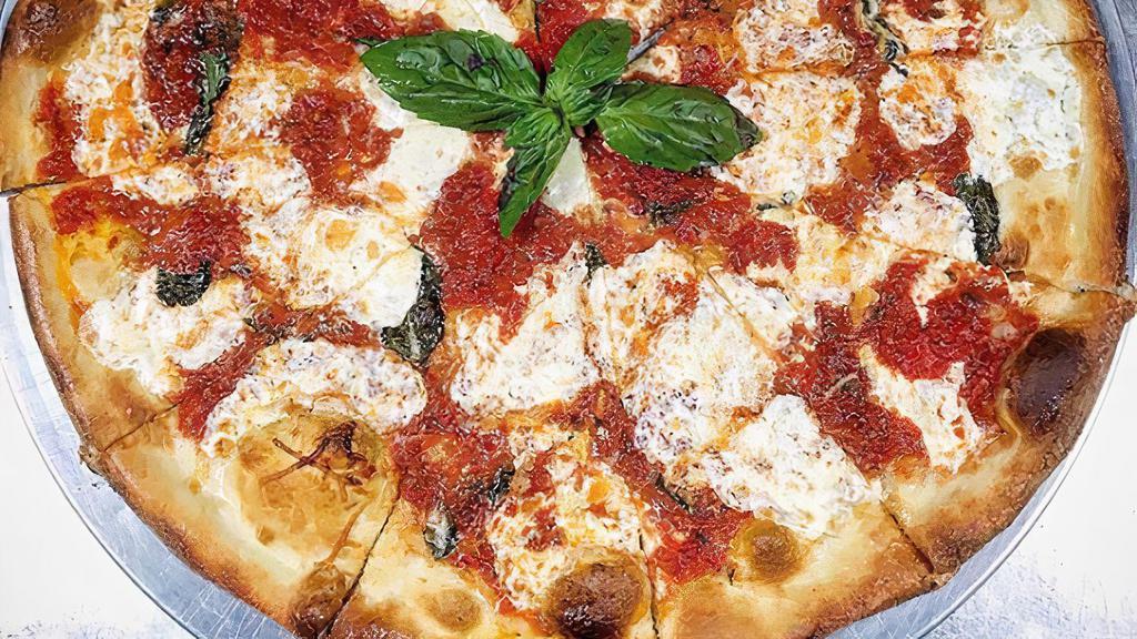Margherita Pizza · Fresh mozzarella, tomato, and fresh basil.