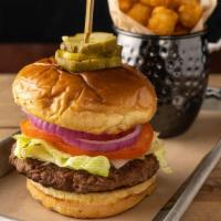 The Impossible Burger · plant-based burger made for meat lovers, lettuce, tomato, onion, garlic aioli, pickle chips