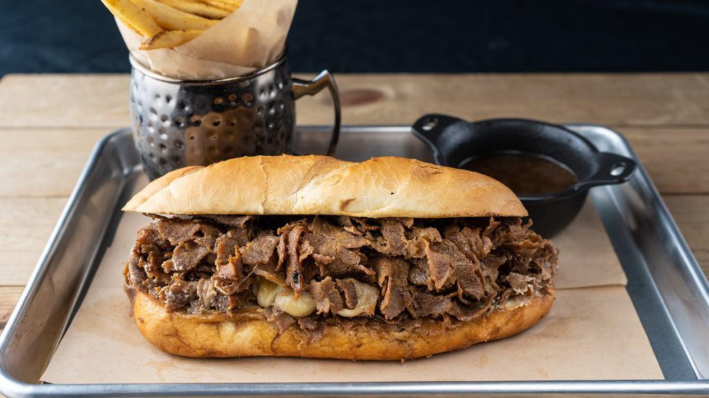 Cheese Steak Dip · shaved sirloin steak, caramelized onions, provolone, herb cheese, toasted hoagie roll, french onion au jus