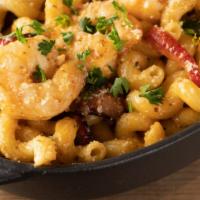 Voodoo Pasta · jumbo shrimp, andouille sausage, cavatappi pasta, red & green bell peppers, house-made spicy...