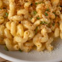 Mac And Cheese · creamy cheddar, cavatappi pasta, spiced Rice Krispies®