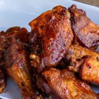 Smoked Chicken Wings (8 Wings)
 · Buffalo / chipotle bbq / honey siracha / garlic parmesan